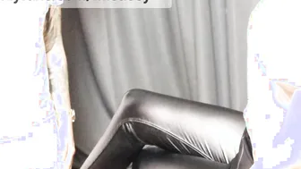 LEATHER LEGGINGS BALLBUSTING AND DEVILS PEDICURE SITTING ON CHAIR