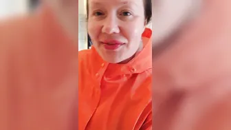 Trying on raincoats into pvc boots - gigantic breasts