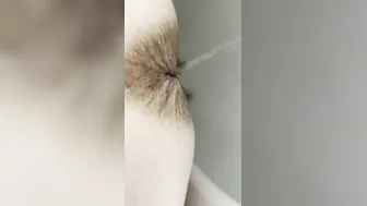 Old woman saggy jugs undressing and pee into restroom
