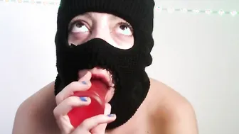 Masked eighteen giving a oral sex to a toy