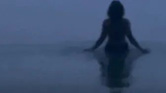 Hispanic cougar Takes an Evening Beach Stroll