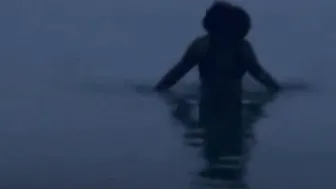 Hispanic cougar Takes an Evening Beach Stroll