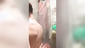 Milf taking a shower