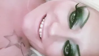 BOMBSHELL BLONDE TEASES ON THE BED