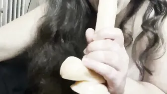 thick women fucks herself into the butt with sex toy and blows it