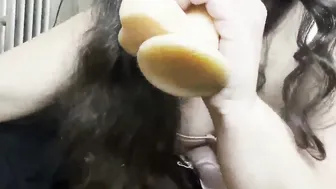 thick women fucks herself into the butt with sex toy and blows it