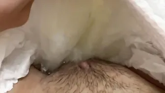 Adorable peeing into a diaper