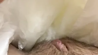 Adorable peeing into a diaper