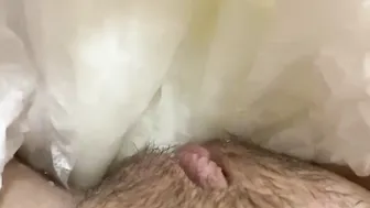 Adorable peeing into a diaper