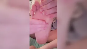 Giantess Painting Toenails Pink with Lotioned Wrinkled Soles and Long Legs