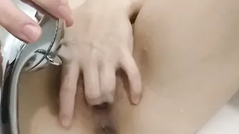 Fingered my vagina inside the shower musturbing with the help of a shower blowjob