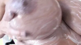 Brandy Robbins is so naughty spreading lotion in her gigantic melons