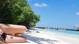 Without underwear on Beach babe touching twat