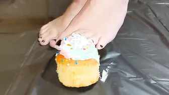 Hot toes smashing a cupcake