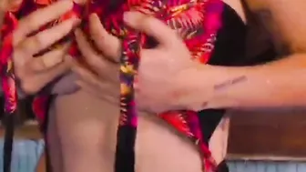 Celia Lora with very huge titties into the pool