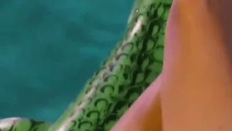 Celia Lora with very huge titties into the pool