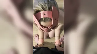 cum on the face of a pink kitty inside handcuffs