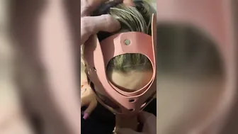 cum on the face of a pink kitty inside handcuffs