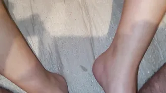 Rubbing his rough dick with my foot