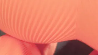 A dark haired into an orange leotard had her booty filled