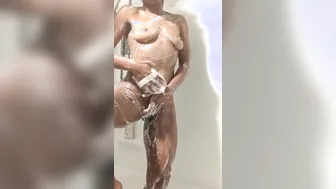 Alternative gothic Ebony women has a shower