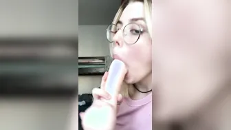 The blonde is having fun at home with a huge latex dick.