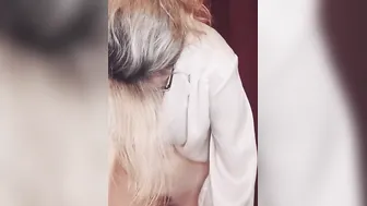 Vulgar professor fucks herself with a sex toy while standing