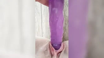 Cunt masturbating with purple cock