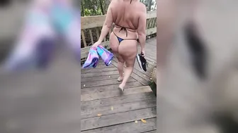 Milf walking into a g-string bikini