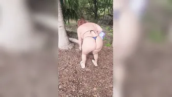 Milf walking into a g-string bikini