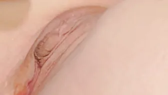 SLOW MOTION. Close-up. Sperm wet down the cunt