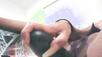 Hispanic pleasures her vagina with cucumber then squirts