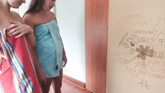 two girls dropping their towels just to jerk off and gives the penis a head through the glory hole