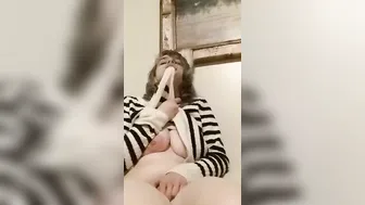 shy kitten chick plays under sweater