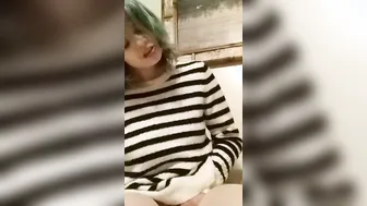 shy kitten chick plays under sweater