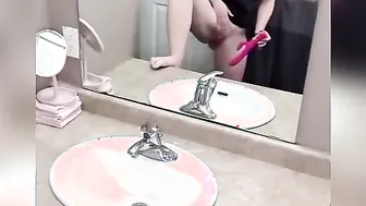 View me (try to) spray down my restroom mirror