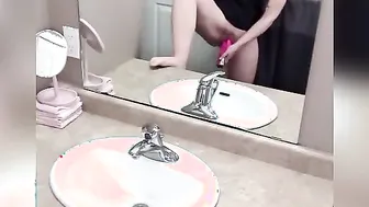 View me (try to) spray down my restroom mirror