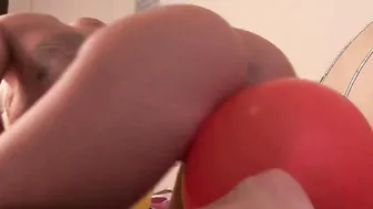 Blonde beauty mastering her rides talent on a balloon