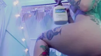 rubbing lotion all over my inked body