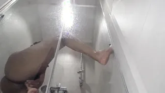 Stepmom caught inside the shower fucking a vibrator and having fun with her cunt