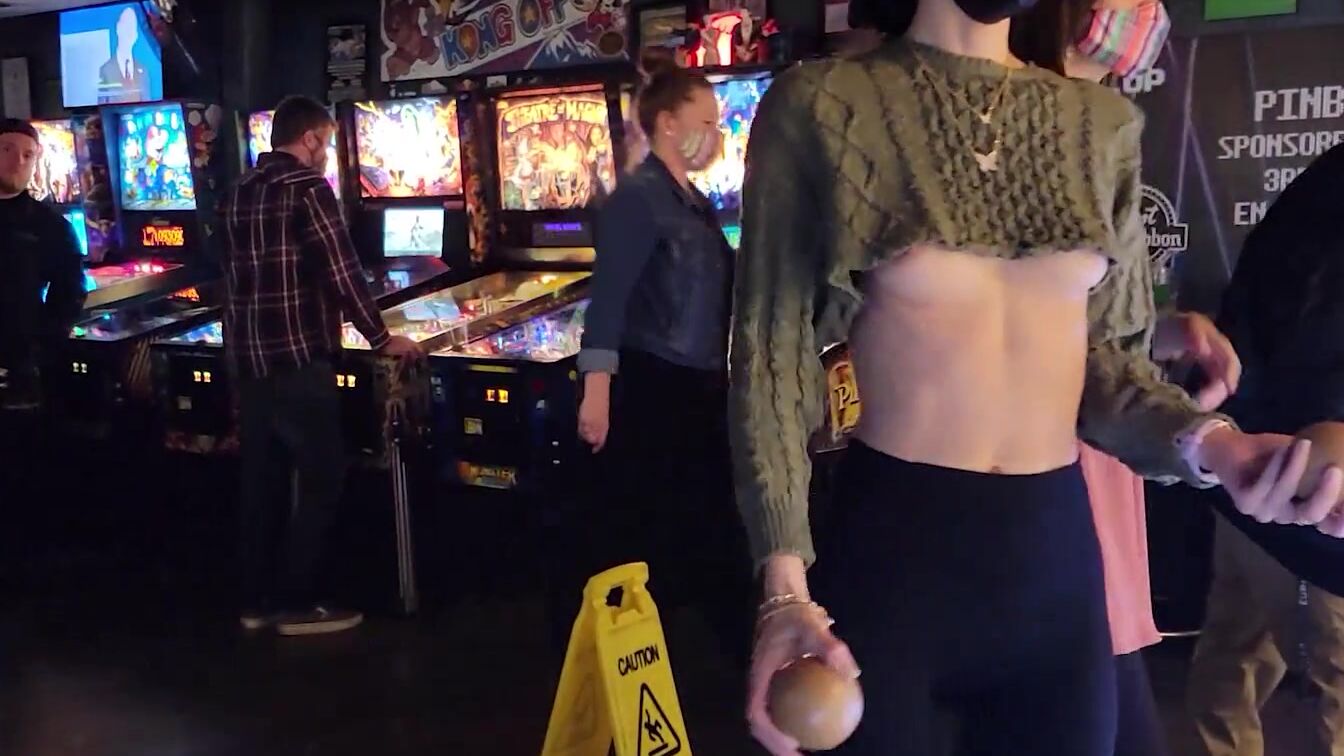 Brazenly flashing melons inside a busy arcade 4kPorn.XXX picture image