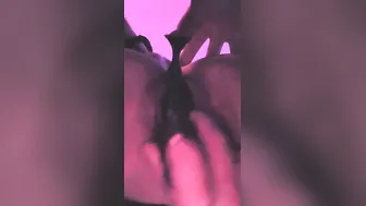 Putting into her booty plug while she plays with her juicy vagina