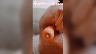 Arab woman sticks 2 huge vegetabiles in her anal and cunt untill squirting orgasm