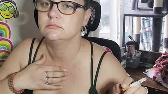Dark Hair Goddess smoking is beauty bra after a long day