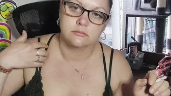 Dark Hair Goddess smoking is beauty bra after a long day