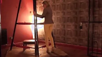 Lady Sonia caged and gets naked naked into the sex dungeon