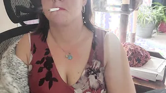 Hot dark haired secretary enjoys a smoke