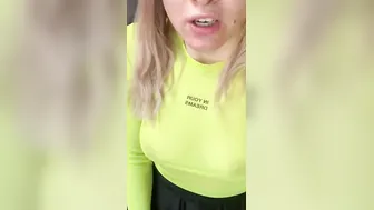Blonde plays into tight lime blouse