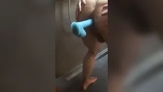Dude fucks sex toy into the shower