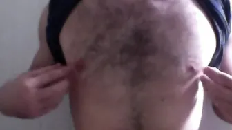 Bushy chested bro shows off pecs